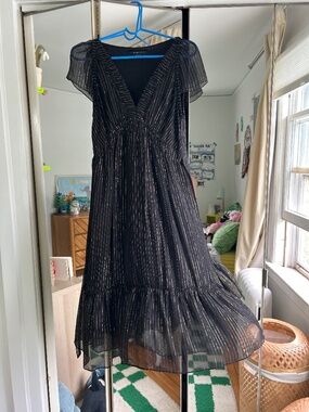 Black dress with gold ribbing